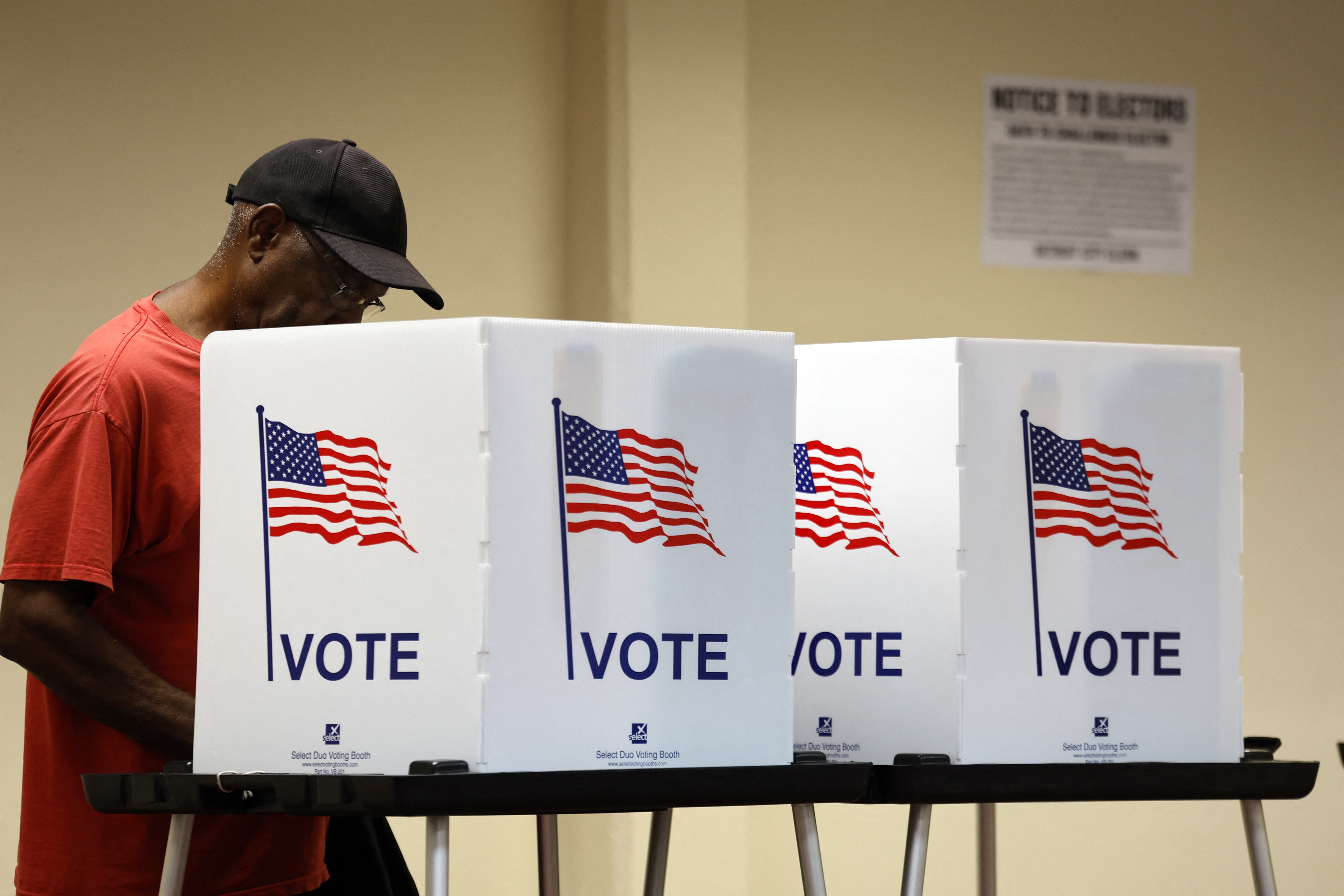 A voter casts an in-person early ballot for the 2024 general election at the Northwest Activities Center on October 29, 2024 in Detroit, Michigan.